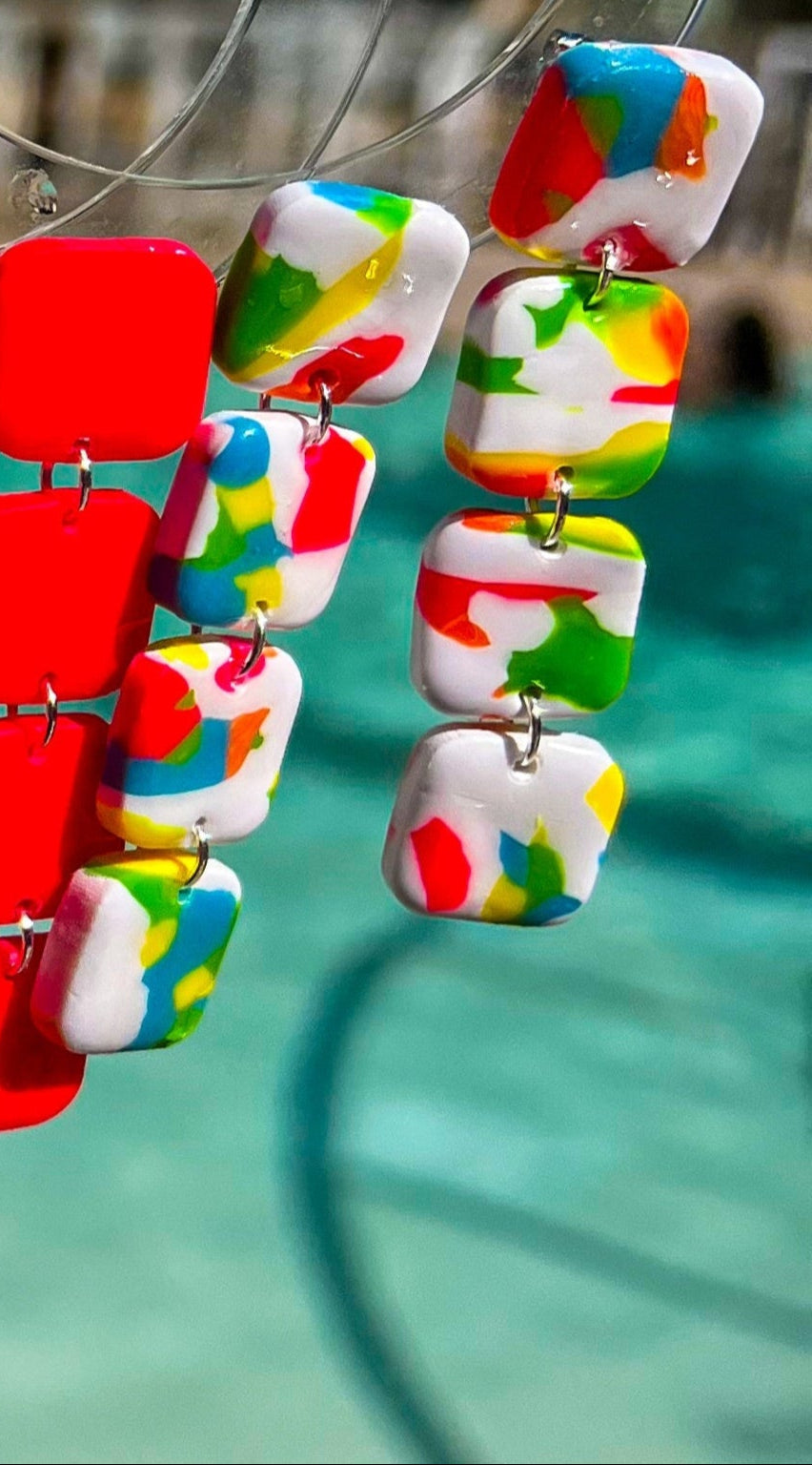 Colorful beaded necklace with a blurred outdoor background