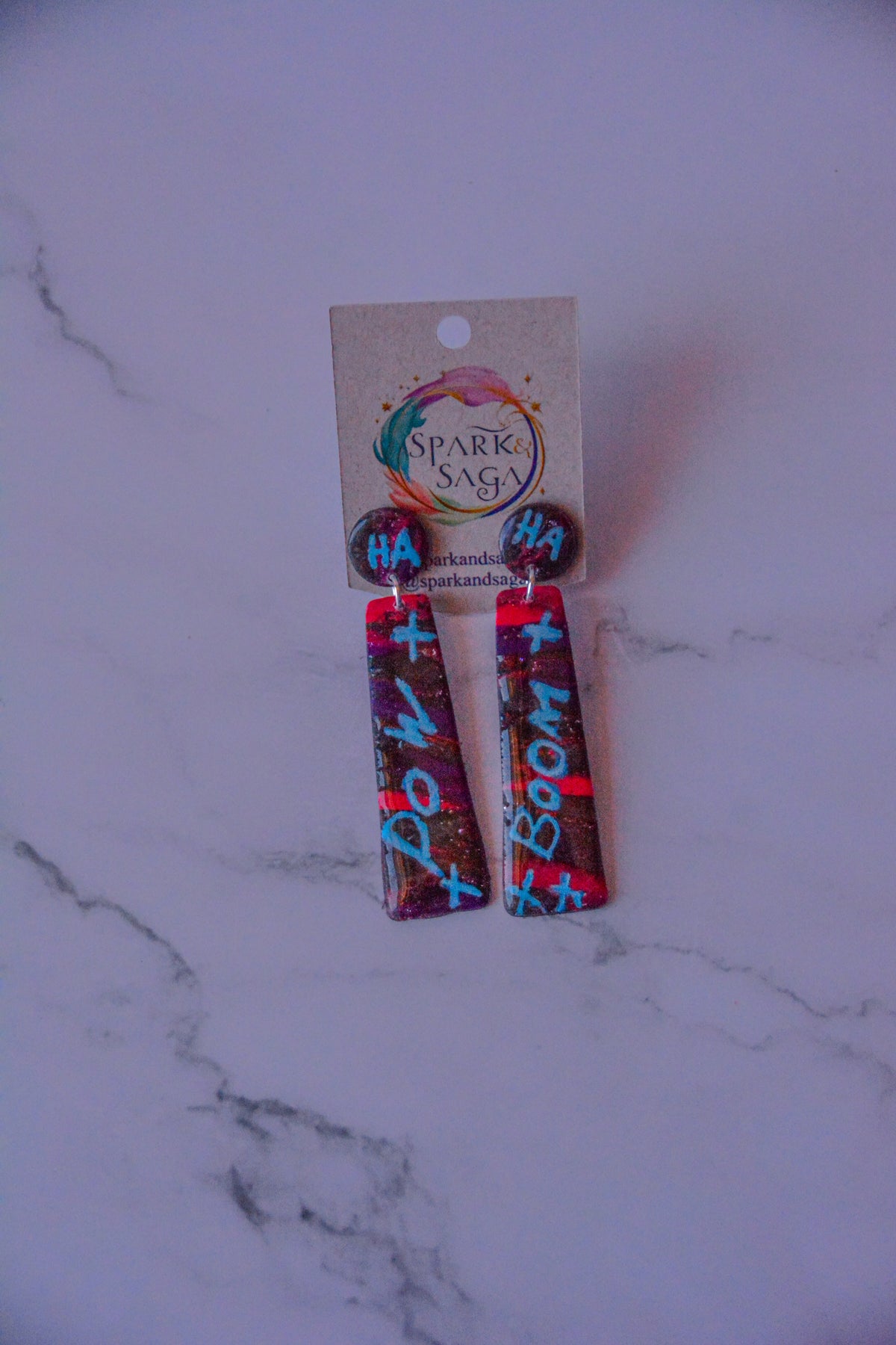 Handmade gamer earrings with graffiti-inspired color and bold shapes
